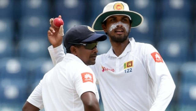 rangana herath l and dinesh chandimal photo afp