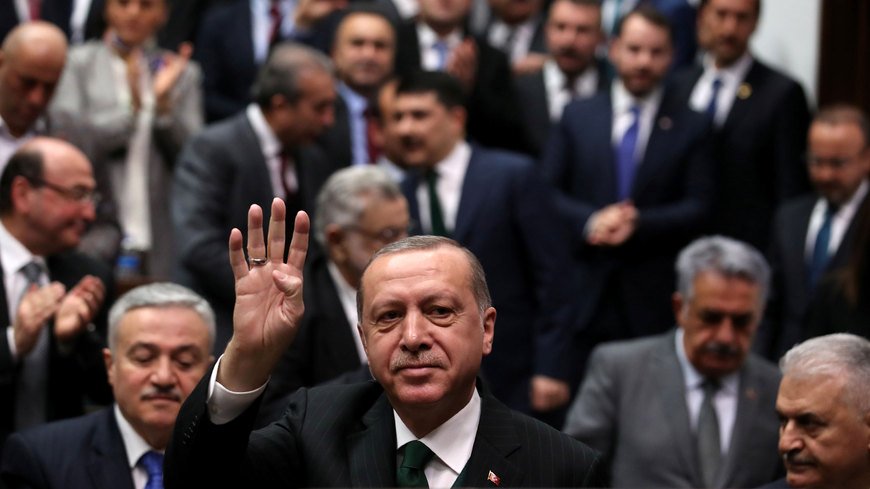 turkish president recep tayyip erdogan greets members of parliament from his ruling justice and development party as he arrives for a meeting at the turkish parliament in ankara photo reuters