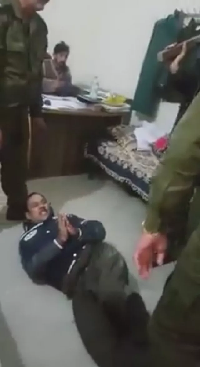 the identity of the man or the police officers has not been ascertained as yet photo screen grab the identity of the man or the police officers has not been ascertained as yet photo screen grab