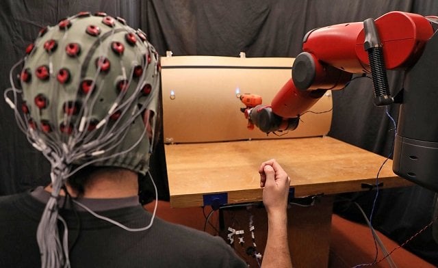 the robot responds to hand gestures from the person photo mit