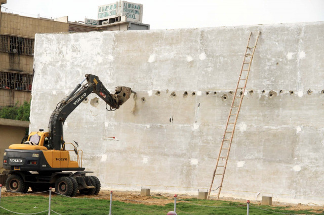 a wall built near ftc building to show advertisements being demolished on the orders of the supreme court photo ppi a wall built near ftc building to show advertisements being demolished on the orders of the supreme court photo ppi