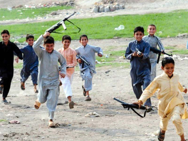 children play with toy guns photo file children play with toy guns photo file