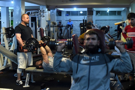 pumping it afghan bodybuilders exercise at a gym in kabul the scene inside this gym is repeated at venues all around the capital photo afp