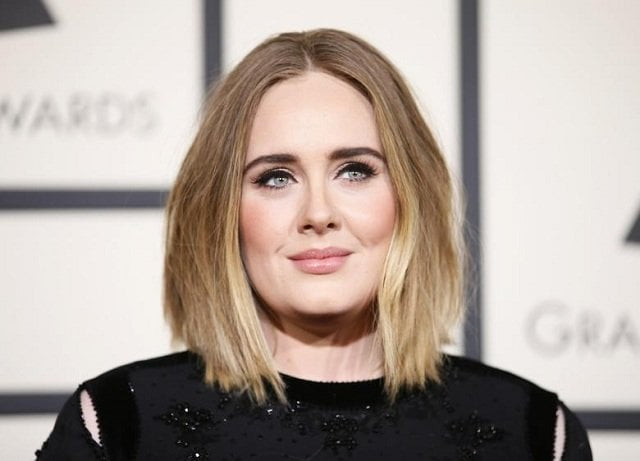 singer adele arrives at the 58th grammy awards in los angeles photo reuters singer adele arrives at the 58th grammy awards in los angeles photo reuters