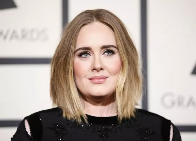 singer adele arrives at the 58th grammy awards in los angeles photo reuters singer adele arrives at the 58th grammy awards in los angeles photo reuters