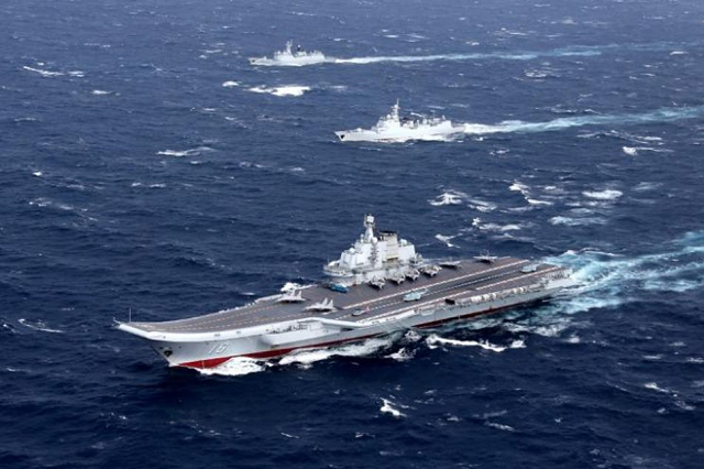 china 039 s liaoning aircraft carrier with accompanying fleet conducts a drill in the south china sea photo reuters