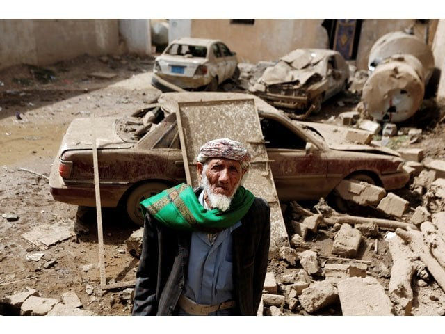 a man stands next to cars damaged by an air strike in amran yemen june 25 2018 photo reuters a man stands next to cars damaged by an air strike in amran yemen june 25 2018 photo reuters