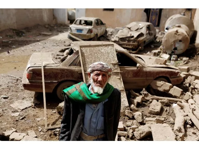 a man stands next to cars damaged by an air strike in amran yemen june 25 2018 photo reuters a man stands next to cars damaged by an air strike in amran yemen june 25 2018 photo reuters