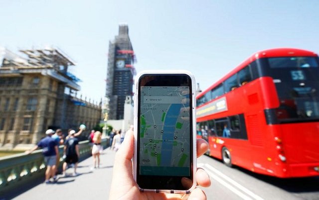 a photo illustration shows the uber app and a bus in london britain june 25 2018 photo reuters
