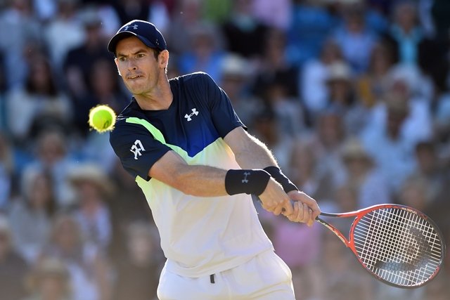 britain 039 s andy murray returns against britain 039 s kyle edmund during their singles second round match at the atp nature valley international tennis tournament photo afp