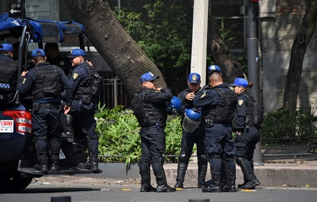 policemen patrol the streets of mexico city on june 29 2018 ahead of the upcoming july 1 presidential election photo afp policemen patrol the streets of mexico city on june 29 2018 ahead of the upcoming july 1 presidential election photo afp