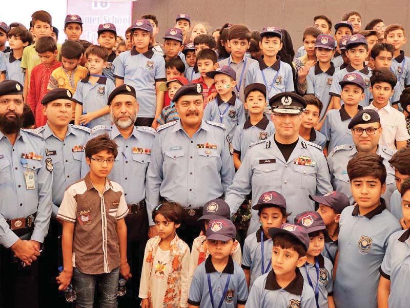 islamabad inspector general of police jan mohammad is seen in a group photo at a sumer camp organised by islamabad police photo express