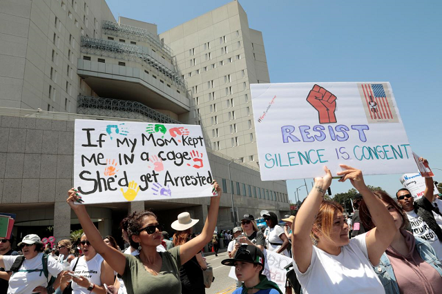 demonstrators protest in front of the metropolitan detention center during a national day of action called quot keep families together quot against the 039 zero tolerance 039 policy in los angeles california photo reuters