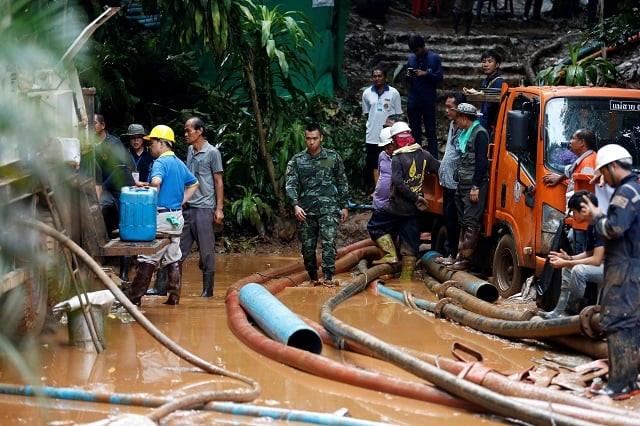 soldiers and rescue workers work near tham luang cave complex as an ongoing search for members of an under 16 soccer team and their coach continues in the northern province of chiang rai thailand july 2 photo reuters soldiers and rescue workers work near tham luang cave complex as an ongoing search for members of an under 16 soccer team and their coach continues in the northern province of chiang rai thailand july 2 photo reuters