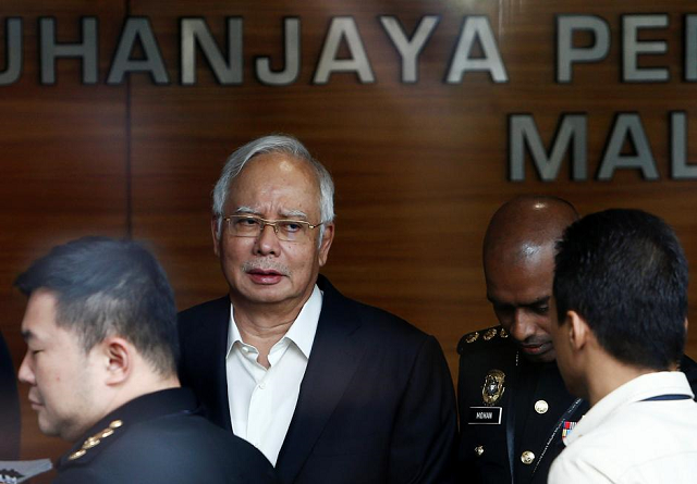 authorities picked up najib from his home after serving him a remand order photo reuters