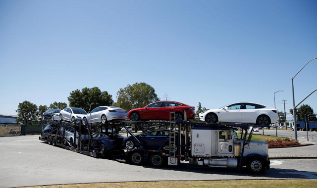 a car carrier trailer carries tesla model 3 electric sedans is seen outside the tesla factory in fremont california us june 22 2018 photo reuters a car carrier trailer carries tesla model 3 electric sedans is seen outside the tesla factory in fremont california us june 22 2018 photo reuters