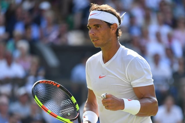 spain 039 s rafael nadal celebrates winning a game against israel 039 s dudi sela during their men 039 s singles first round match on the second day of the 2018 wimbledon championships photo afp spain 039 s rafael nadal celebrates winning a game against israel 039 s dudi sela during their men 039 s singles first round match on the second day of the 2018 wimbledon championships photo afp