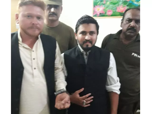 two other gunmen of pti candidate for pp 163 constituency were held for firearms display photo express two other gunmen of pti candidate for pp 163 constituency were held for firearms display photo express