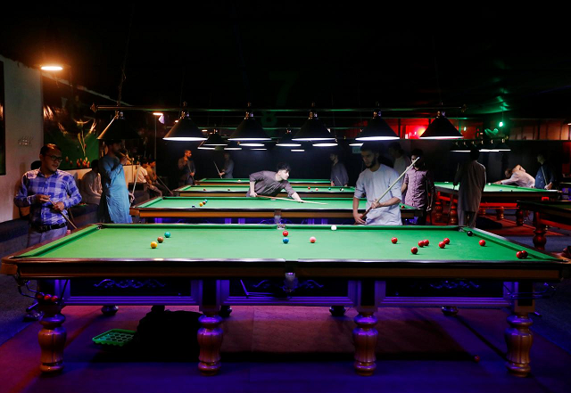 afghan youth play snooker in kabul photo reuters