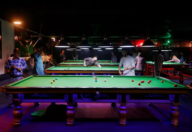 afghan youth play snooker in kabul photo reuters afghan youth play snooker in kabul photo reuters