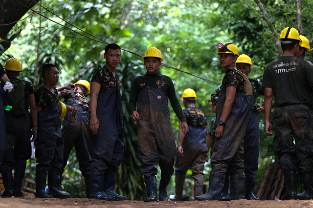 farmer lek is one of many unsung heroes pitching into the rescue as volunteers have arrived at the site photo reuters