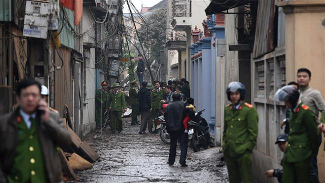 vietnam makes arrests for bombing of police station photo afp