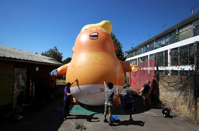 people inflate a helium filled donald trump blimp which they hope to deploy during the president of the united states 039 upcoming visit in london britain june 26 2018 photo reuters people inflate a helium filled donald trump blimp which they hope to deploy during the president of the united states 039 upcoming visit in london britain june 26 2018 photo reuters
