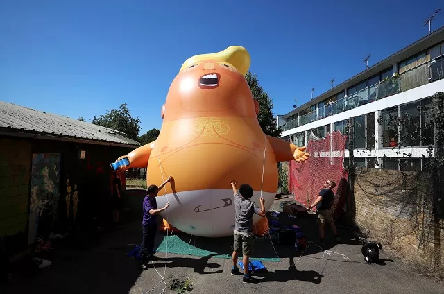 people inflate a helium filled donald trump blimp which they hope to deploy during the president of the united states 039 upcoming visit in london britain june 26 2018 photo reuters people inflate a helium filled donald trump blimp which they hope to deploy during the president of the united states 039 upcoming visit in london britain june 26 2018 photo reuters