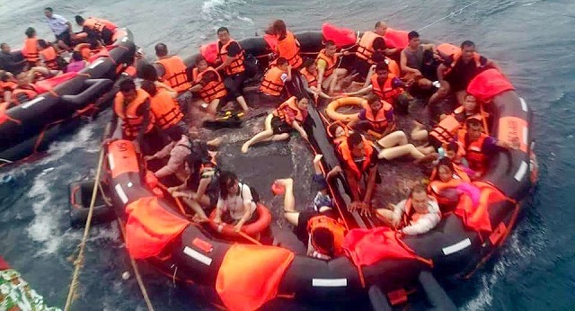 all of the passengers in both cases were pulled from the sea alive photographs circulating on social media showed soaked and exhausted passengers    most of them asian    in life jackets being pulled on inflatable rafts to safety photo courtesy phuket department of disaster prevention and mitigation