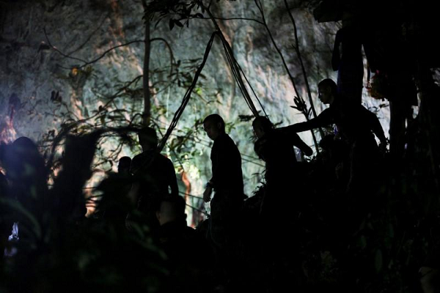 military personnel are seen in front of the tham luang cave where 12 boys and their soccer coach are trapped in the northern province of chiang rai thailand july 6 2018 photo reuters military personnel are seen in front of the tham luang cave where 12 boys and their soccer coach are trapped in the northern province of chiang rai thailand july 6 2018 photo reuters