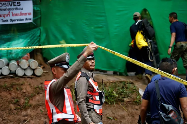 to escape the children must dive through dark narrow passageways sometimes no more than two feet wide that have challenged some of the world s leading cave divers photo reuters to escape the children must dive through dark narrow passageways sometimes no more than two feet wide that have challenged some of the world s leading cave divers photo reuters