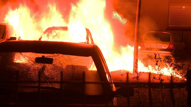 a scene from the riots where more than 50 cars were burned photo afp