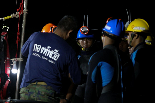 thai divers gather before they enter to the tham luang cave where 12 boys and their soccer coach are trapped in the northern province of chiang rai thailand july 6 2018 photo reuters