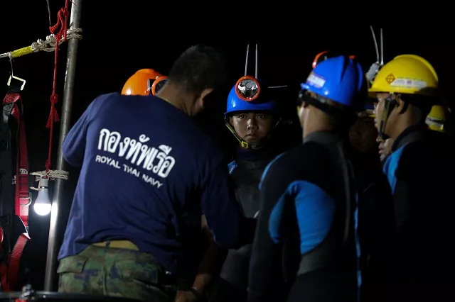thai divers gather before they enter to the tham luang cave where 12 boys and their soccer coach are trapped in the northern province of chiang rai thailand july 6 2018 photo reuters thai divers gather before they enter to the tham luang cave where 12 boys and their soccer coach are trapped in the northern province of chiang rai thailand july 6 2018 photo reuters