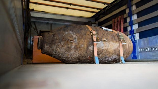 a disarmed world war ii bomb on the platform of a truck near muehlheim bridge in cologne on may 27 2015 german authorities evacuated around 20 000 people from their homes until the bomb was disarmed on may 27 2015 photo afp