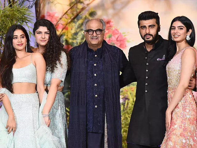 ndian bollywood film producer and director boney kapoor c poses for a picture with his daughters janhvi kapoor l anshula kapoor 2l and khushi kapoor r and son arjun kapoor 2l during the wedding reception of actress sonam kapoor and businessman anand ahuja in mumbai afp ndian bollywood film producer and director boney kapoor c poses for a picture with his daughters janhvi kapoor l anshula kapoor 2l and khushi kapoor r and son arjun kapoor 2l during the wedding reception of actress sonam kapoor and businessman anand ahuja in mumbai afp