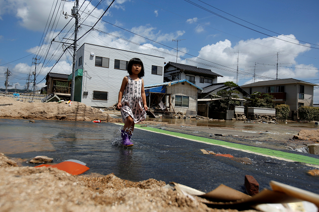 the record downpours that began last week have stopped and receding flood waters have laid bare the destruction that has cut a swathe through the west of the country photo reuters