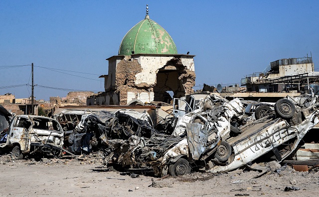 a picture taken on july 9 2018 shows a view of the dome of the destroyed al nuri mosque in the old city of mosul a year after the city was retaken by the iraqi government forces photo afp