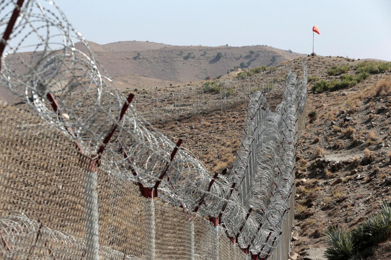 a view of the border fence outside the kitton outpost on the border with afghanistan in north waziristan photo reuters file