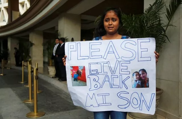 elsa ortiz holds a placard with pictures of her son david tobar who 039 s currently at a shelter in houston texas after being separated while protesting outside the hotel where u s homeland security secretary kirstjen nielsen is holding a meeting with foreign ministers from mexico and central america in guatemala city guatemala july 10 2018 photo reuters elsa ortiz holds a placard with pictures of her son david tobar who 039 s currently at a shelter in houston texas after being separated while protesting outside the hotel where u s homeland security secretary kirstjen nielsen is holding a meeting with foreign ministers from mexico and central america in guatemala city guatemala july 10 2018 photo reuters