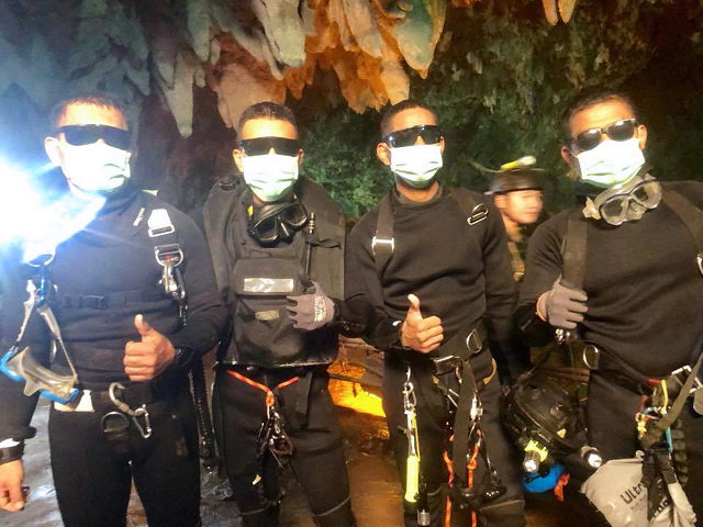 thai navy seals giving a thumbs up after exiting safely from the tham luang cave photo afp thai navy seals giving a thumbs up after exiting safely from the tham luang cave photo afp