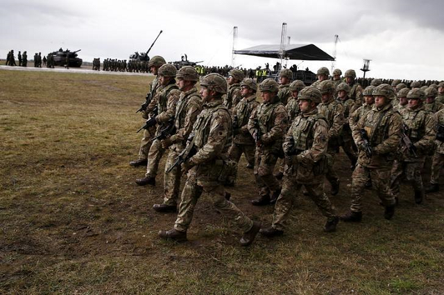 the extra troops will be from the welsh guards regiment with around half deploying in august and a second contingent to follow in february photo reuters the extra troops will be from the welsh guards regiment with around half deploying in august and a second contingent to follow in february photo reuters