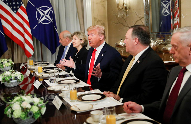 us president donald trump gestures as he and u s secretary of defence james mattis us secretary of state mike pompeo attend a bilateral breakfast with nato secretary general jens stoltenberg ahead of the nato summit in brussels belgium july 11 2018 photo reuters