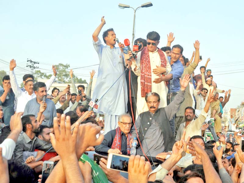 capt retd safdar addresses a rally on july 8 in spite of a ban under ecp code of conduct on car rallies photo express