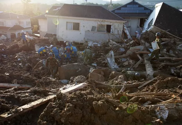 more than 70 000 military police and firefighters toiled through the debris in a grim search for the missing photo reuters more than 70 000 military police and firefighters toiled through the debris in a grim search for the missing photo reuters