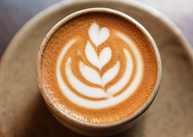 a prepared cup of coffee at the quot flat white quot cafe in the qatari capital doha 039 s tawar mall photo afp