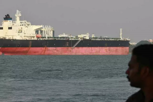 a man looks at the napoli registered italian merchant vessel enrica lexie anchored at the cochin oil terminal cot in the southern indian city of kochi february 17 2012 photo reuters a man looks at the napoli registered italian merchant vessel enrica lexie anchored at the cochin oil terminal cot in the southern indian city of kochi february 17 2012 photo reuters