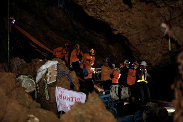 a huge media pack of more than 1 000 journalists gathered at the mouth of the cave feeding audiences all over the globe with every twist and turn of the dramatic rescue until its joyful conclusion on tuesday photo reuters a huge media pack of more than 1 000 journalists gathered at the mouth of the cave feeding audiences all over the globe with every twist and turn of the dramatic rescue until its joyful conclusion on tuesday photo reuters
