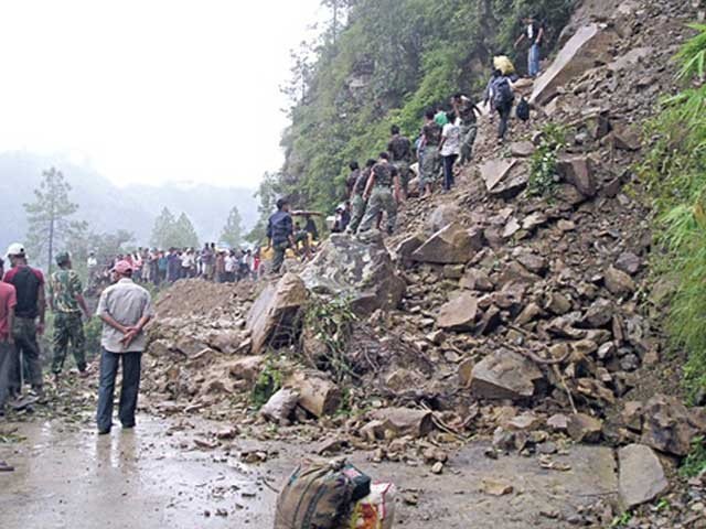 afghan villagers search for survivors after landslide photo file