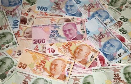 turkey lira slumps to new record lows after erdogan commments